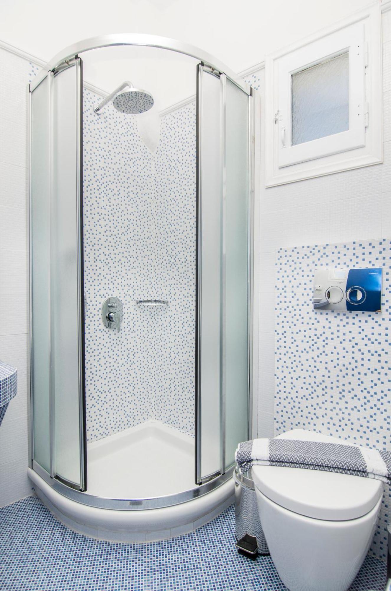 White & Blue Apartment Perivolos  Phòng bức ảnh